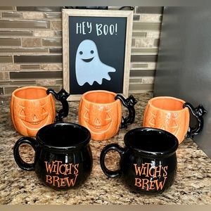 5 Halloween Mugs, 2 Cauldron Witch's
Brew mug, 3 Orange Jack O Lantern Mug